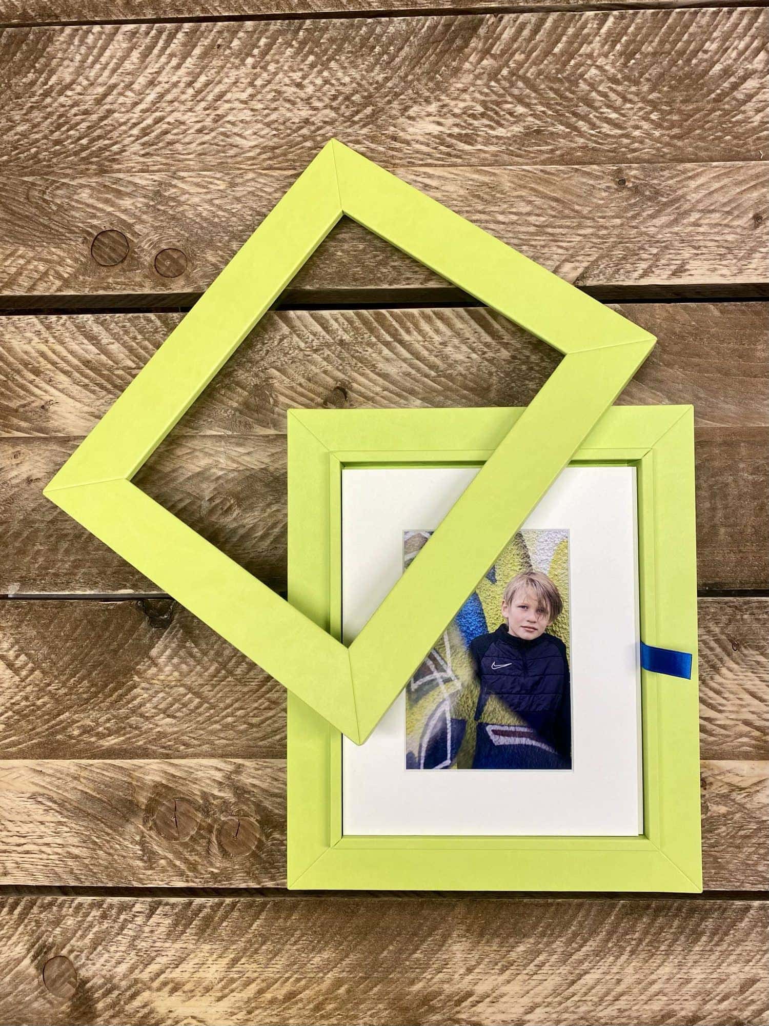 A Reveal Portrait Box in lime leatherette