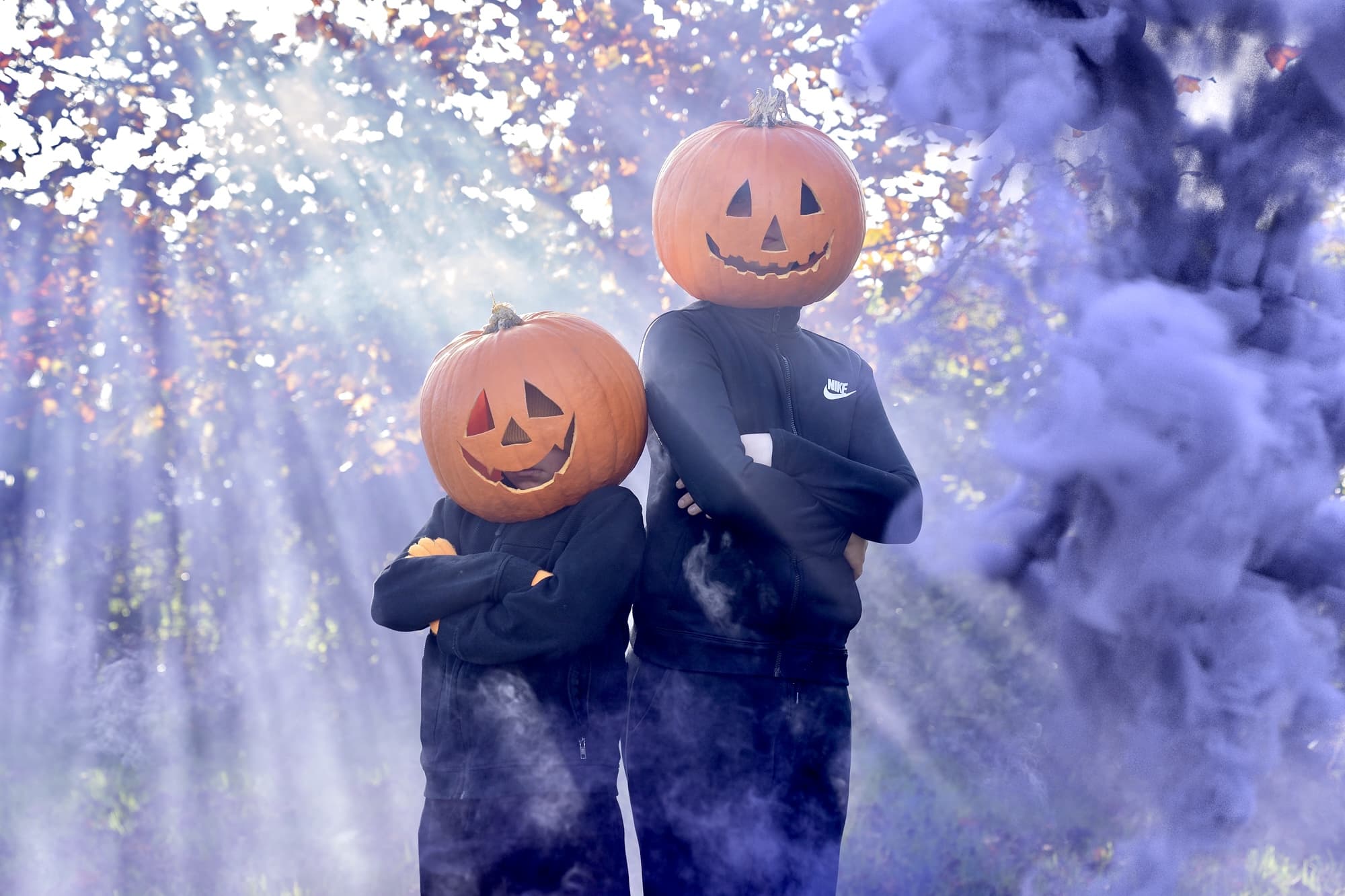 Children in pumpkin heads for halloween
