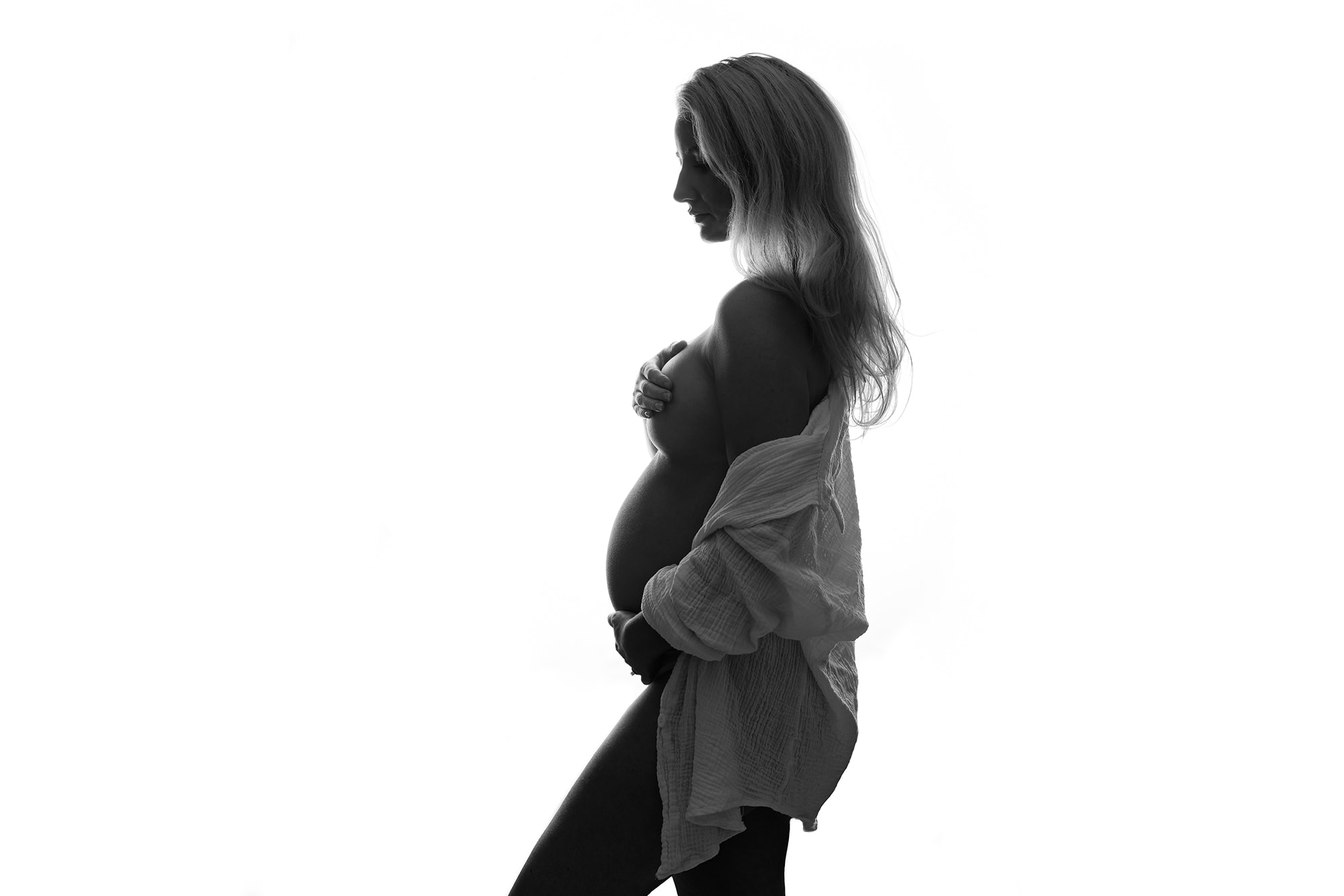 maternity photoshoot in Northamptonshire, lady in husband's shirt