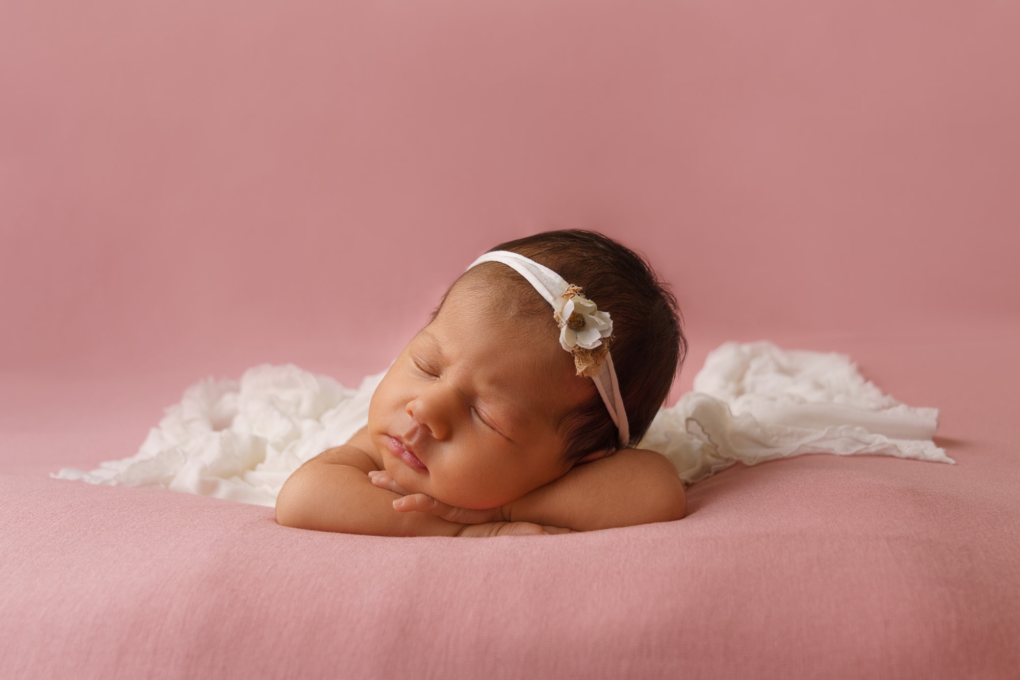 newborn photographer in Northampton baby on pink blanket