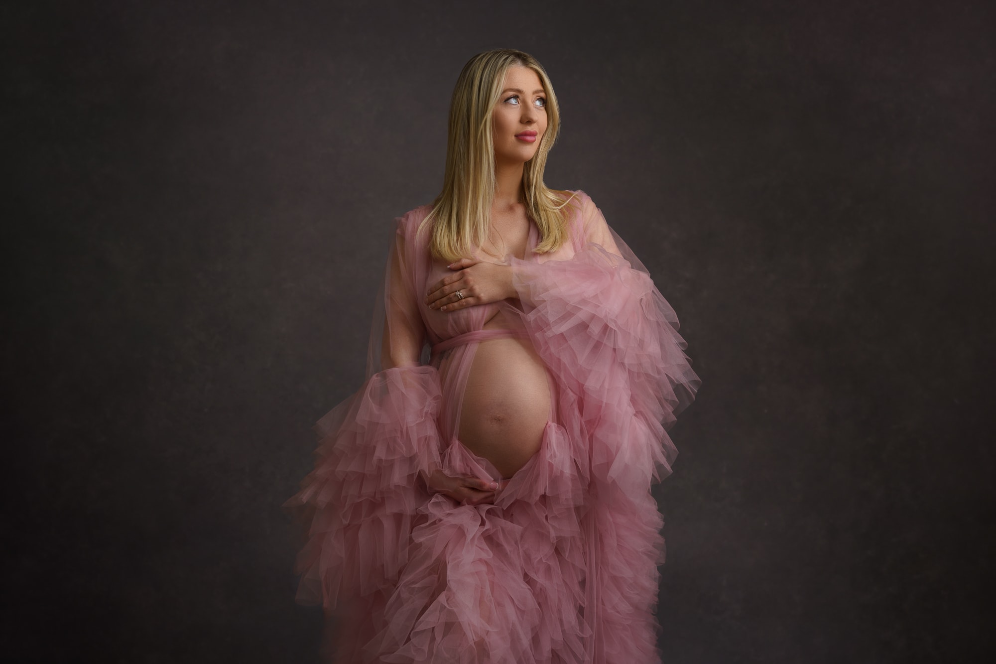 maternity portrait in pink dress