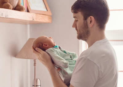 Day in the Life Photography - at home in Northamptonshire dad with newborn