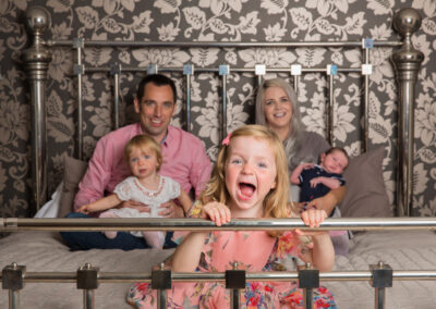 Day in the Life Photography - at home in Northamptonshire family of 5 on the bed