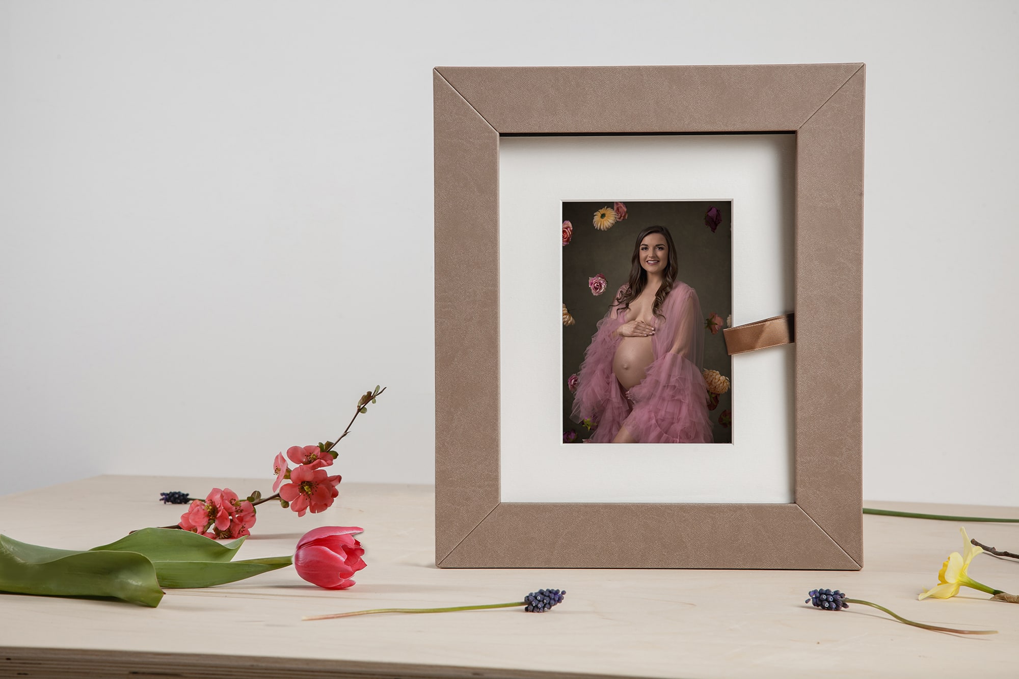 A Reveal Box from Miranda Walton Photography is the perfect way to display your maternity photographs.