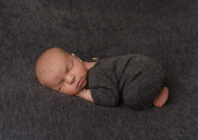 newborn photography on grey colours